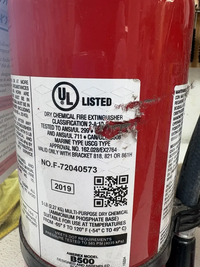 UL fire extinguisher with label damage