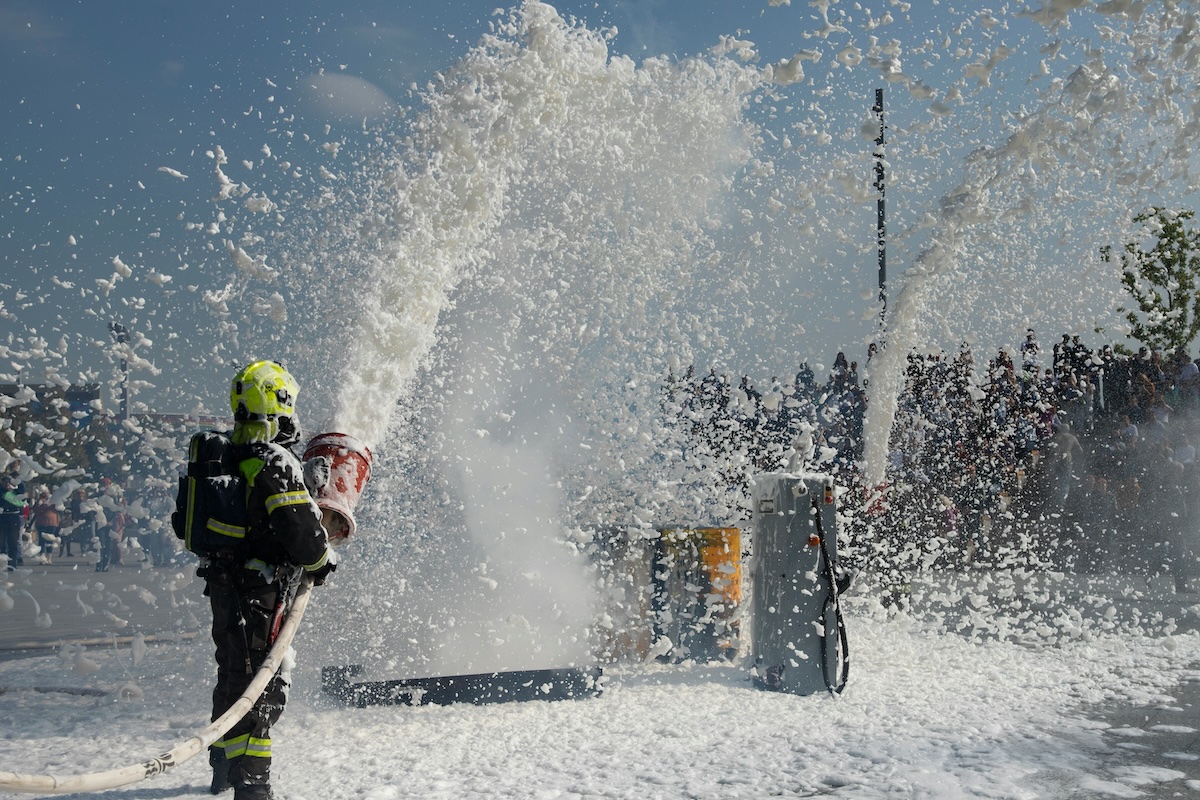 Individual spraying chemical fire suppressant
